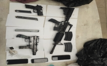 ضبط أسلحة في مجمع بنايات في اللد واعتقال 5 مشتبهين